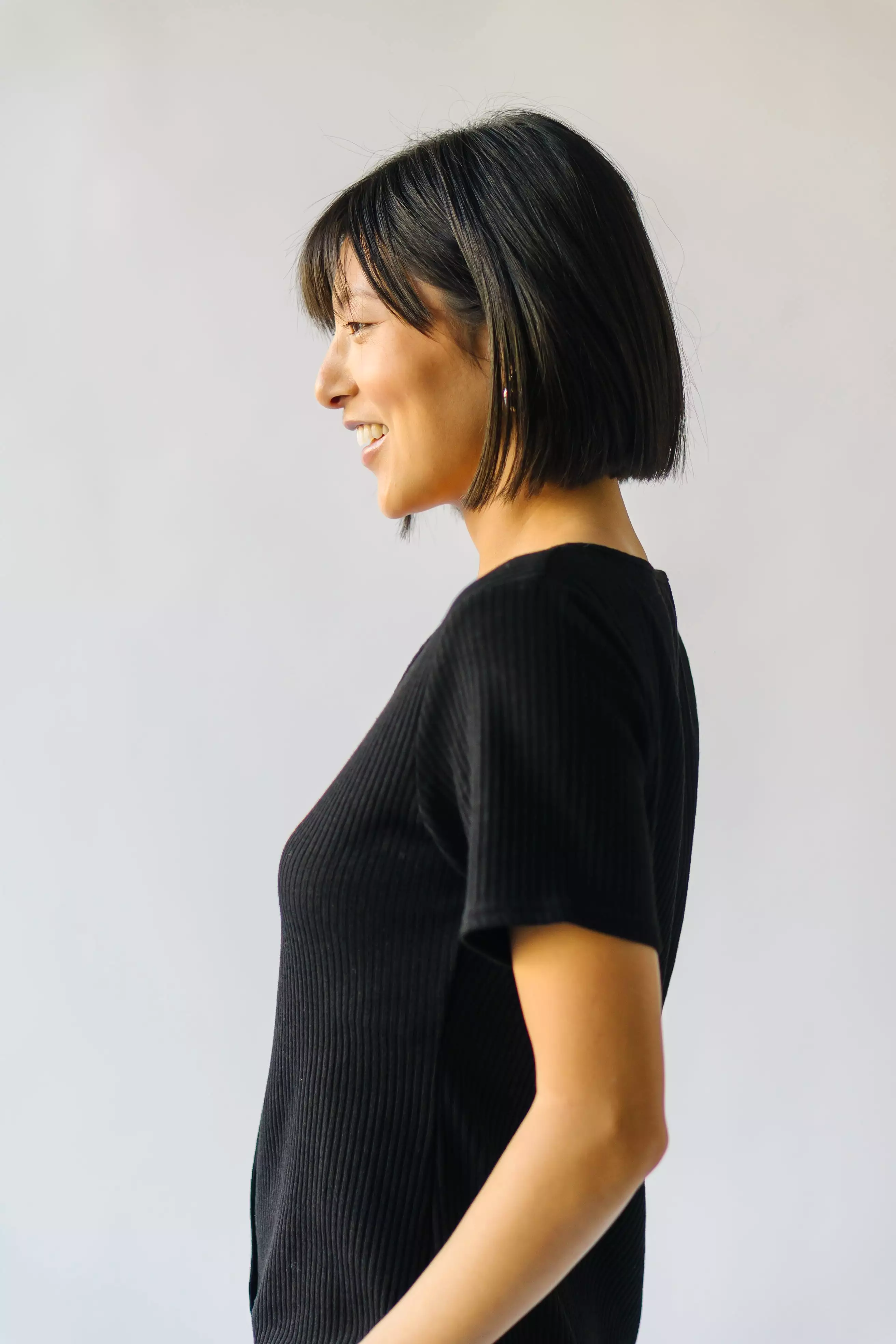 The Pomona Ribbed Button Dress in Black